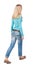 Side view of walking woman in jeans. beautiful girl in motion.