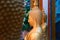 Side view wax statues of Buddhist monks in the temple. Big golden figures. Copy space.