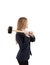 Side view of a woman holding a sledge hammer