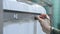 Side View Worker Checks White Intermediate Bulk Container