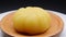 Side view yellow morden moon cake rotating