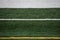 Sideline painted markings on a football field with no people or equipement in shot