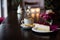 Sideview of piece of raspberry cream cake on wooden table