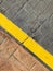 Sidewalk background - yellow line on road street border