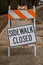 Sidewalk Closed Sign Askew on Stand Full Frame