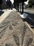 Sidewalk decorated with cobblestones in the city of Tarragona Spain