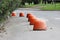 sidewalk near the house and orange hemisphere parking strengthened against the entry of vehicles. Relevant when the danger terror