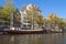 Sidewalk view in Amsterdam with beautiful october trees