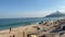 A sidewalk and a view of Rio beach.