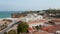 Sideway aerial drone view of Lagos city close to sensational coastline beach, Portugal, day