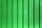 Siding green metal vertical panels texture