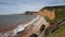 Sidmouth beach and coast Devon England UK to the west PAN
