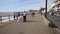 Sidmouth promenade seafront Devon people walking