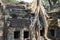 Siem Reap, Cambodia - 22 March 2018: Tourists in temple of Angkor Wat complex, Cambodia. Traveling girl making photo