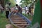 SIEM REAP, CAMBODIA - NOVEMBER 2016: Boat team members inspecting their boat at traditional boat races