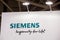 Siemens company logo on the wall. Siemens is a German largest manufacturing and electronics company