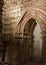 SIENA, ITALY - OCTOBER 9, 2018: Fragment of brick masonry and arch of the 13th century on the lower floors under the church Siena