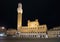 Siena landmark night photo. Piazza del Campo and Mangia tower. Tuscany, Italy