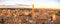 Siena sunset skyline. Mangia tower landmark. Italy