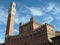 Sienna, Italy, December 10, 2019. The Palazzo Pubblico is a palace in Siena, Tuscany, central Italy. The Torre del Mangia is a