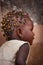 Sierra Leone, the typical head of hair with braids African child