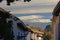 Sierra Nevada mountain tops with snow above the roofs of Albayzin neighbourhood, Granada, on a cloudy da