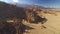 Sierra Nevada Mountains and Mt Whitney from Alabama Hills Desert and Rock Formation Aerial Shot Tilt Up