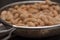 Sieve filled with beans ready to be cooked