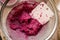 Sieving raspberry puree