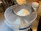 Sifting Flour into a Bucket to be Used to Bake Bread at Home During Quarantine