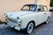 Sighisoara, Romania, 12 August 2021: Grey white Trabant German vintage car parked in a street in the city center, the most common