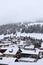 Sight to the foggy, snowy Village of Churwalden, Switzerland in Wintertime