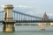 Sightseeing boat under Secheni chain bridge in Budapest