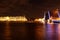 Sightseeing in the city of St. Petersburg in Russia, the Neva river with the raised Palace bridge at night