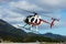 A sightseeing helicopters  flying over the Franz Josef glacier at the southern island of New Zealand.