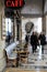 Sightseers walking past outdoor cafes on the streets of Paris,France,2016