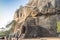 Sigiriya, Sri Lanka: 03/17/2019: Rock fortress, Lion rock showing tourist walk way to the summit of the rock.