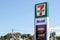 The sign of a 7-Eleven Convenience Store and Mobil Petrol Station