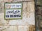 Sign Along Via Dolorosa where Jesua walked through Jerusalem