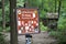 Sign for Appalachian Trail permitted uses covered in sticker graffiti