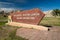 Sign for the Ben Reifel Visitor Center in Badlands National Park in summer