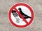 sign birds do not feed attached to the wall of the house in the city