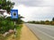 Sign board showing petrol pump in 500 meters on a highway