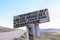 Sign from the Bodie Ghost Town road, giving drivers directions to local towns of Lee Vining, Hawthorne and Bridgeport California