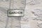 Sign on building outdoor gardien means guardian concierge service in french