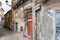 Sign for a Cafe hanging on an old decrepit building in Porto