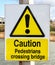 Sign - Caution Pedestrians Crossing Bridge