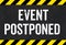 Sign with caution stripes - Event postponed