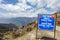 Sign of the the Chelela Highest Point and view at the snow capped Himalaya mountains in Bhutan