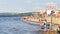 A sign on the city beach `Bathe forbidden.` in a hot summer day. Text in Russian: Bathing is prohibited